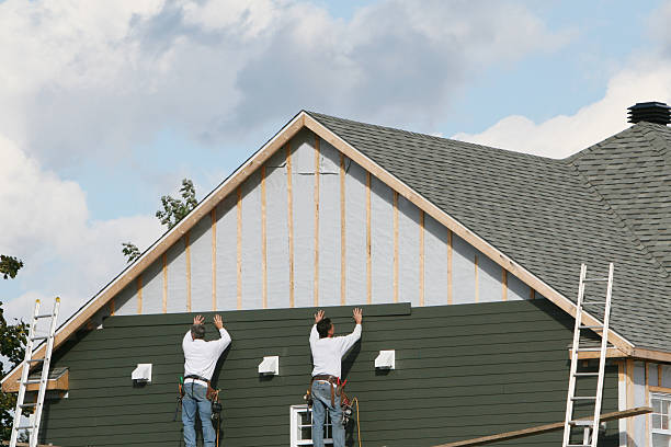 Professional Siding Installation technician working in Devon, PA